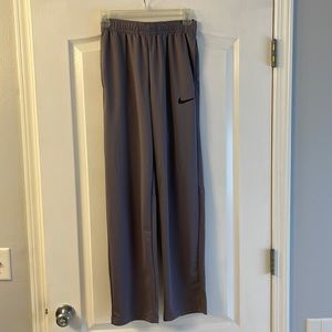 Young men’s gray Nike track pants